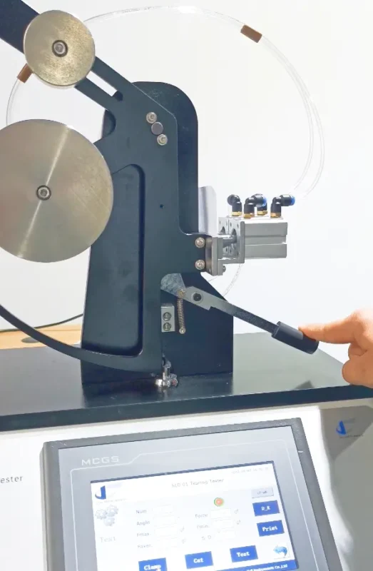 Elmendorf tear test creating slit